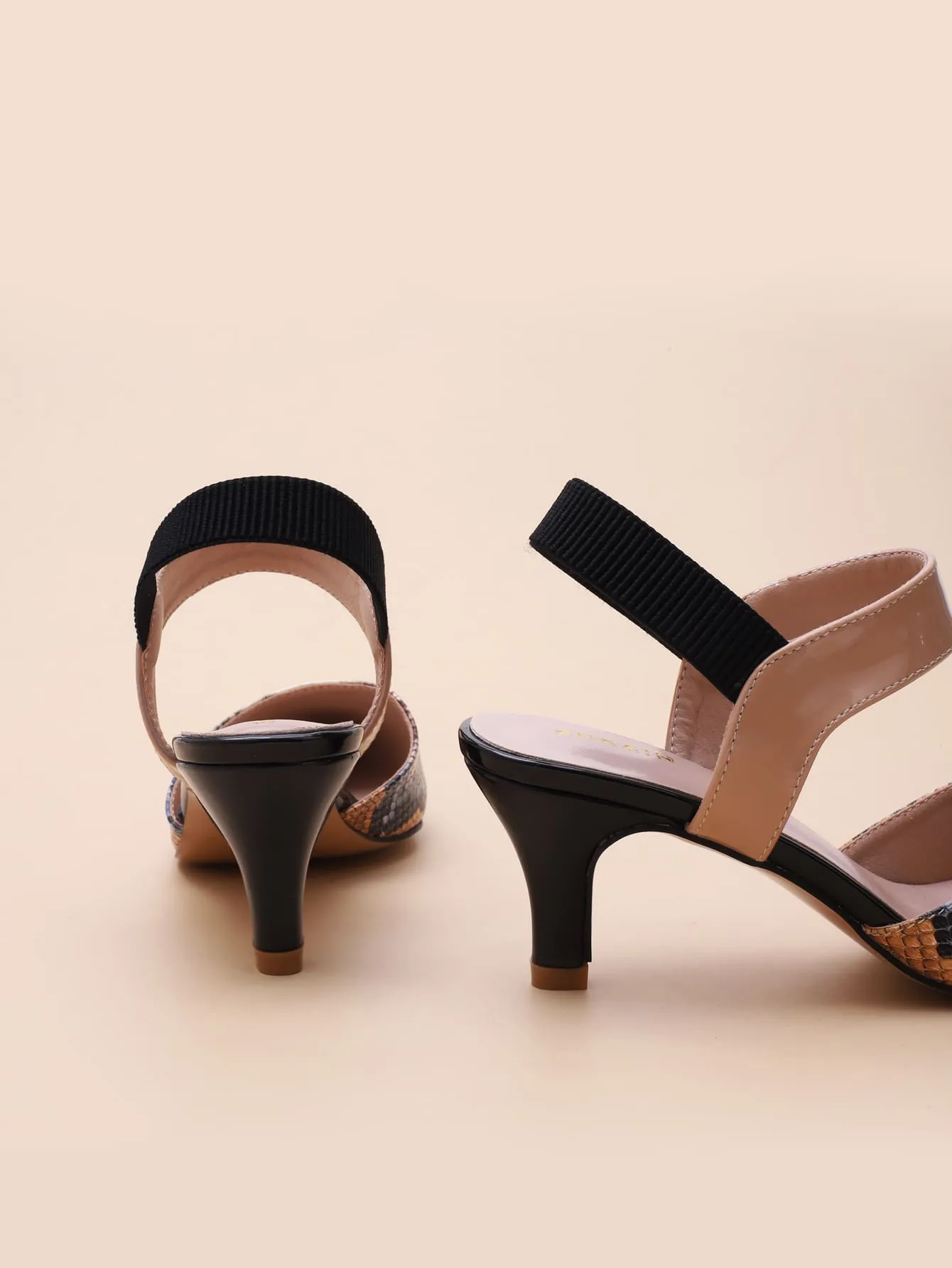 Point Toe Snakeskin Slingback Pumps